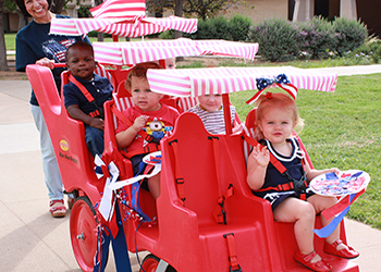 Toddlers in strollers out for a walk