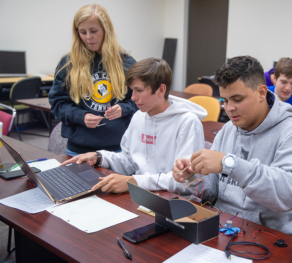 Engineering students and instructor in the classroom