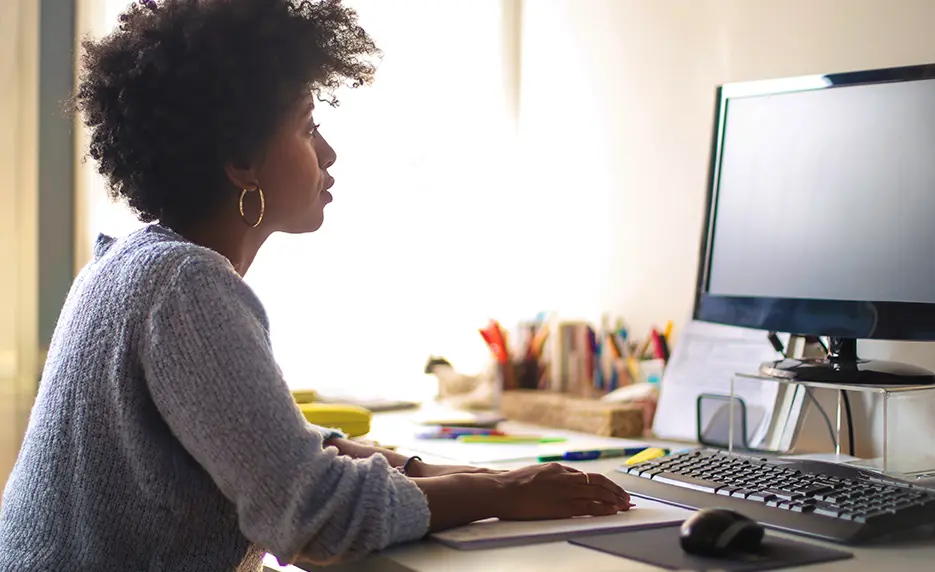 Young woman working at a computer