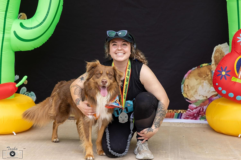 The image to use for this article. Listing image managed through RSS tab. Brycie Tamayo with her dog Cowboy