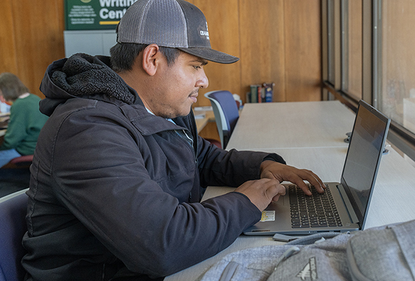 student studying in writing center