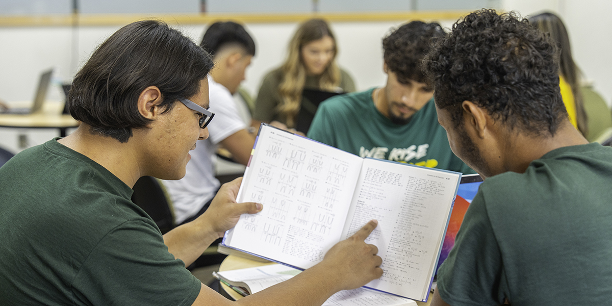 Midland College student and tutor working together
